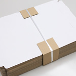 食い込み傷が付くのを防止するダンボール製の当て紙(エッジボード) 1